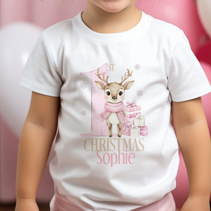 Close-up of the personalised pink reindeer Christmas vest showing the baby's name.