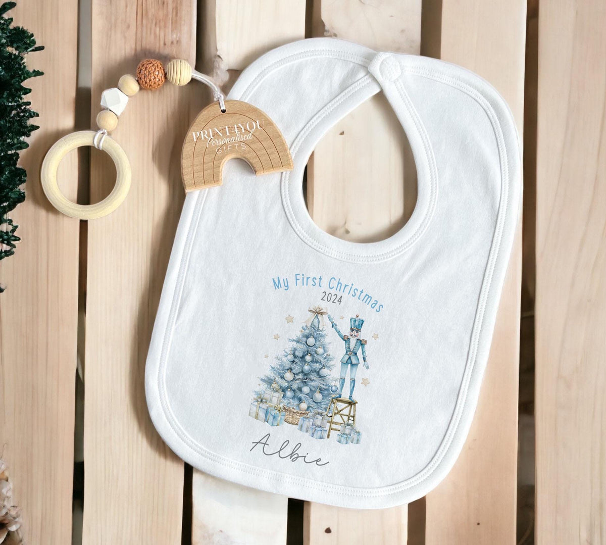 Personalised baby's first Christmas vest, front view showing custom name