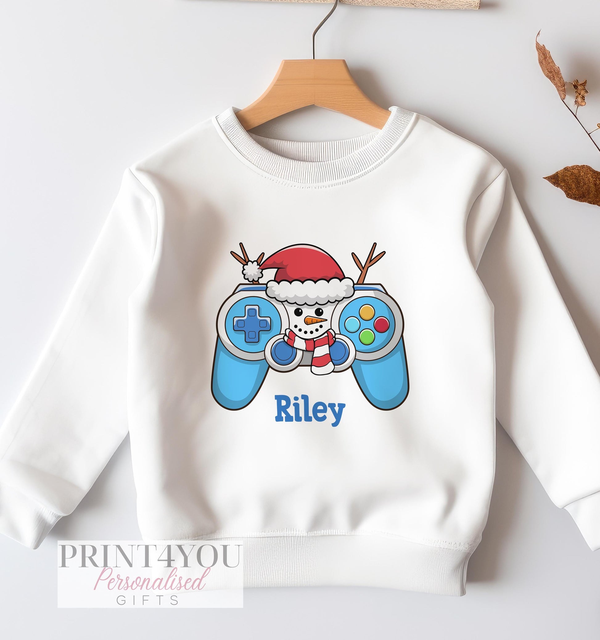 White cotton Christmas sweatshirt with snowman holding a games controller print and personalised name, size 6-12 months