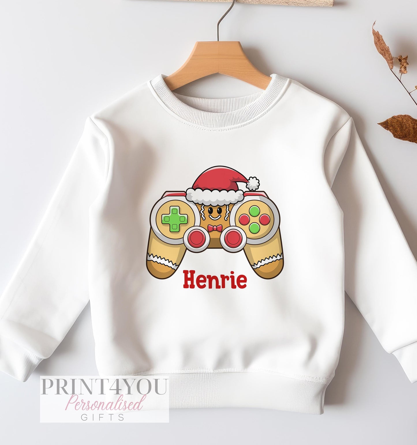 Personalised gaming Christmas jumper, gingerbread man with games controller design, white cotton sweatshirt, size 6-12 months