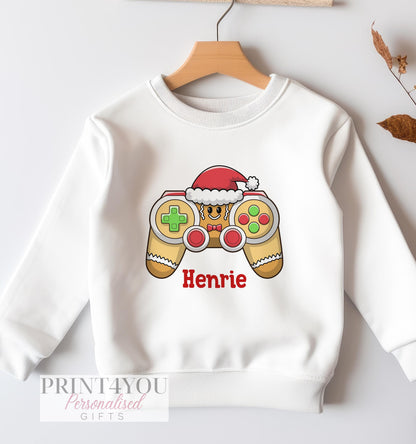 Personalised gaming Christmas jumper, gingerbread man with games controller design, white cotton sweatshirt, size 6-12 months