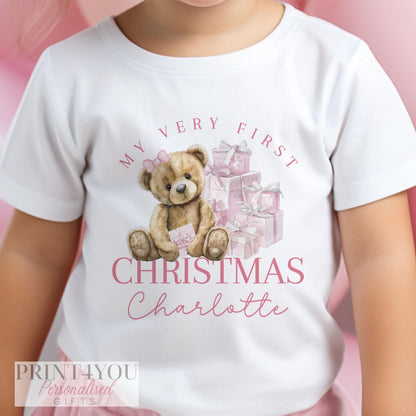 Close-up of the festive design and personalised text on the baby's first Christmas vest.