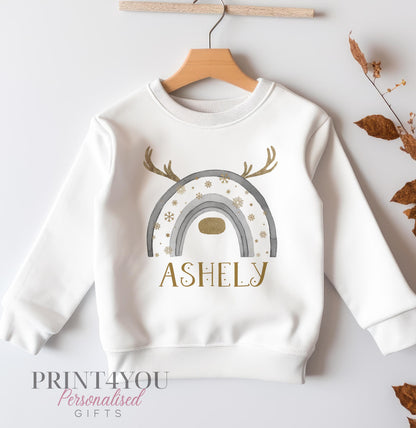 White cotton sweatshirt with silver and gold reindeer print and personalised name, size 6-12 months