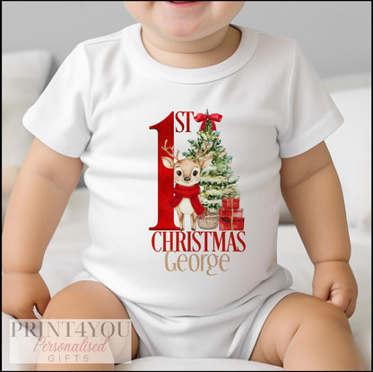Close-up of the red reindeer print and personalised name on a baby's first Christmas vest
