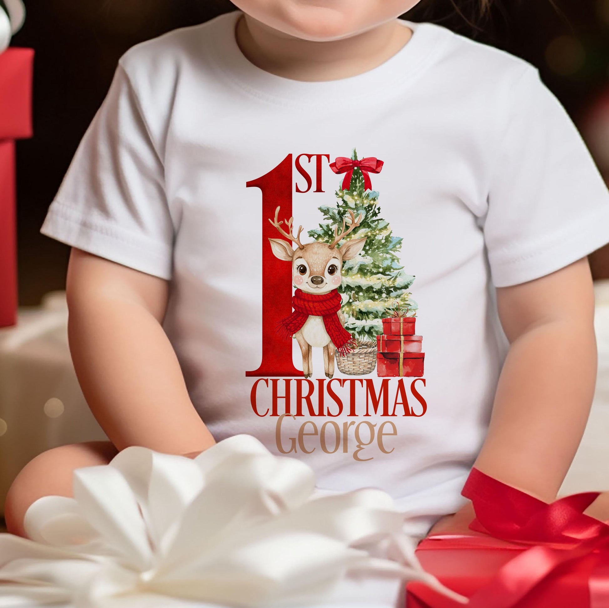 Personalised red reindeer vest for baby's first Christmas, front view showing custom name