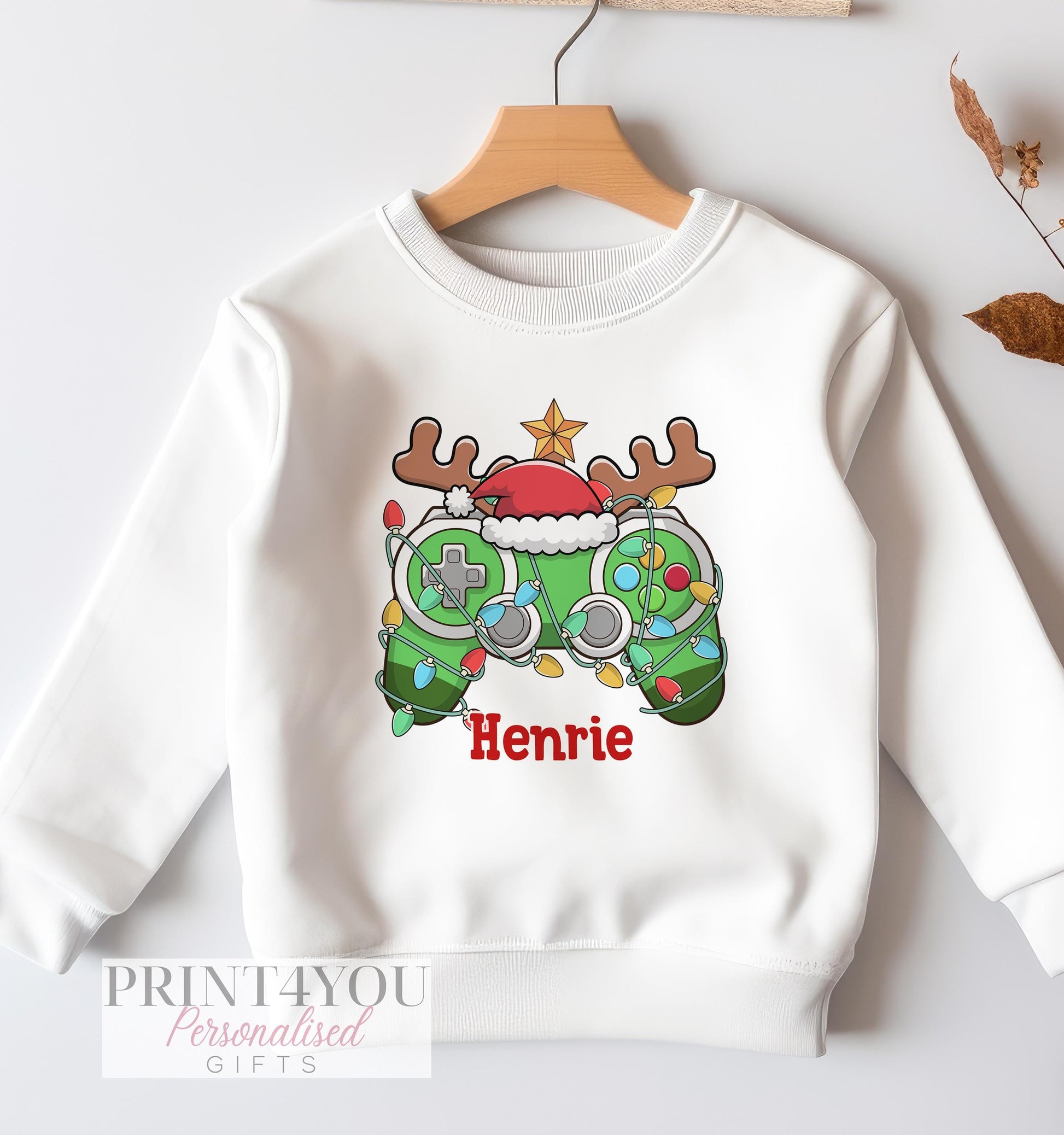 White Christmas jumper with green gaming controller print and personalised name, size 6-12 months