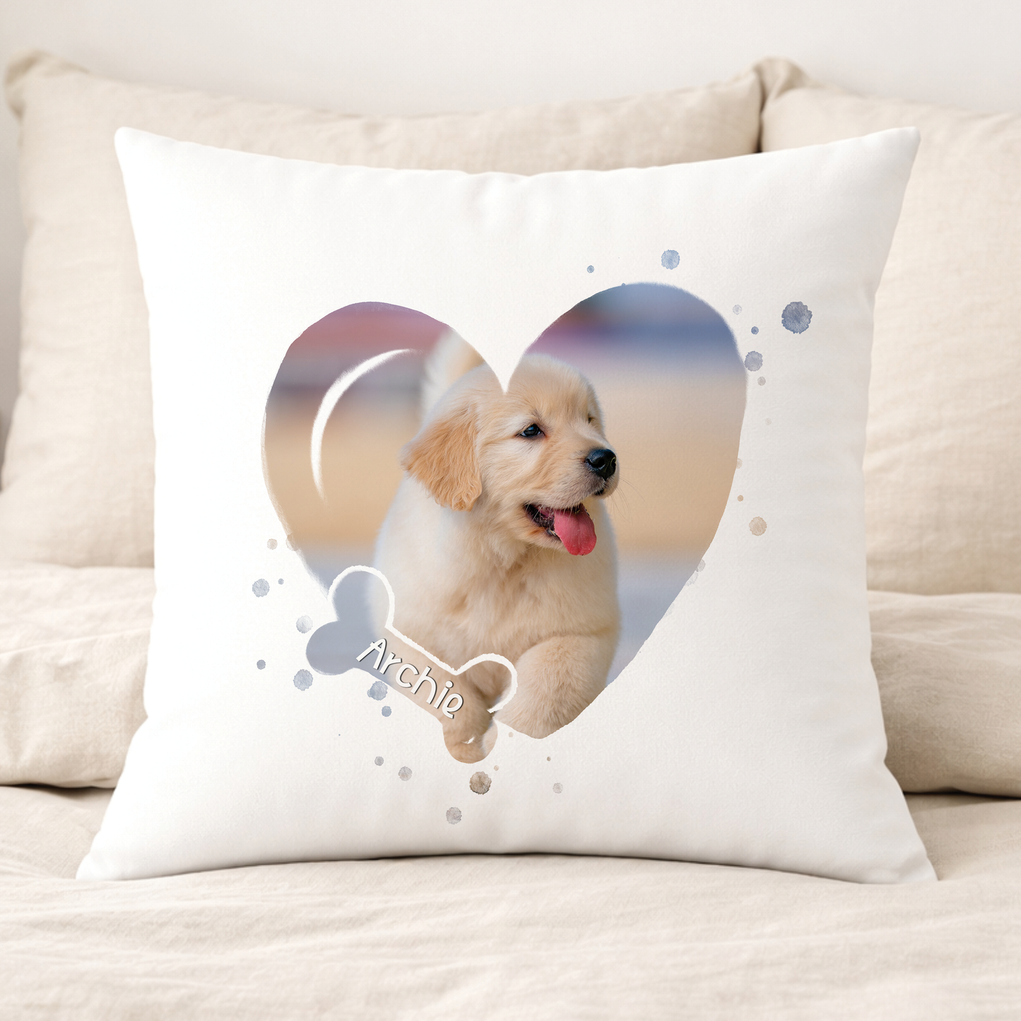 Personalised dog photo cushion with the pet's picture set inside a soft heart-shaped frame alongside their printed name