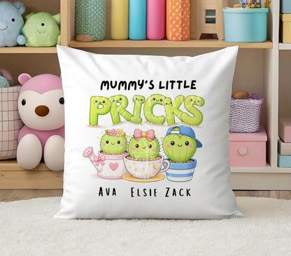 Personalised cushion cover printed with a cactus family design and playful 'little pricks' wording, styled on a sofa