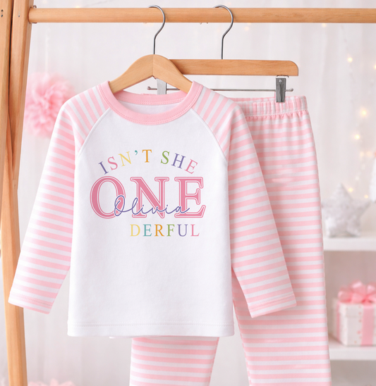 Children's clothing with the girls 1st birthday pyjamas design