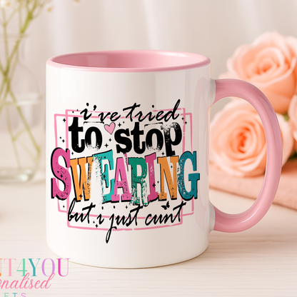 Pink-handled ceramic mug printed with cheeky 'can't stop swearing' design