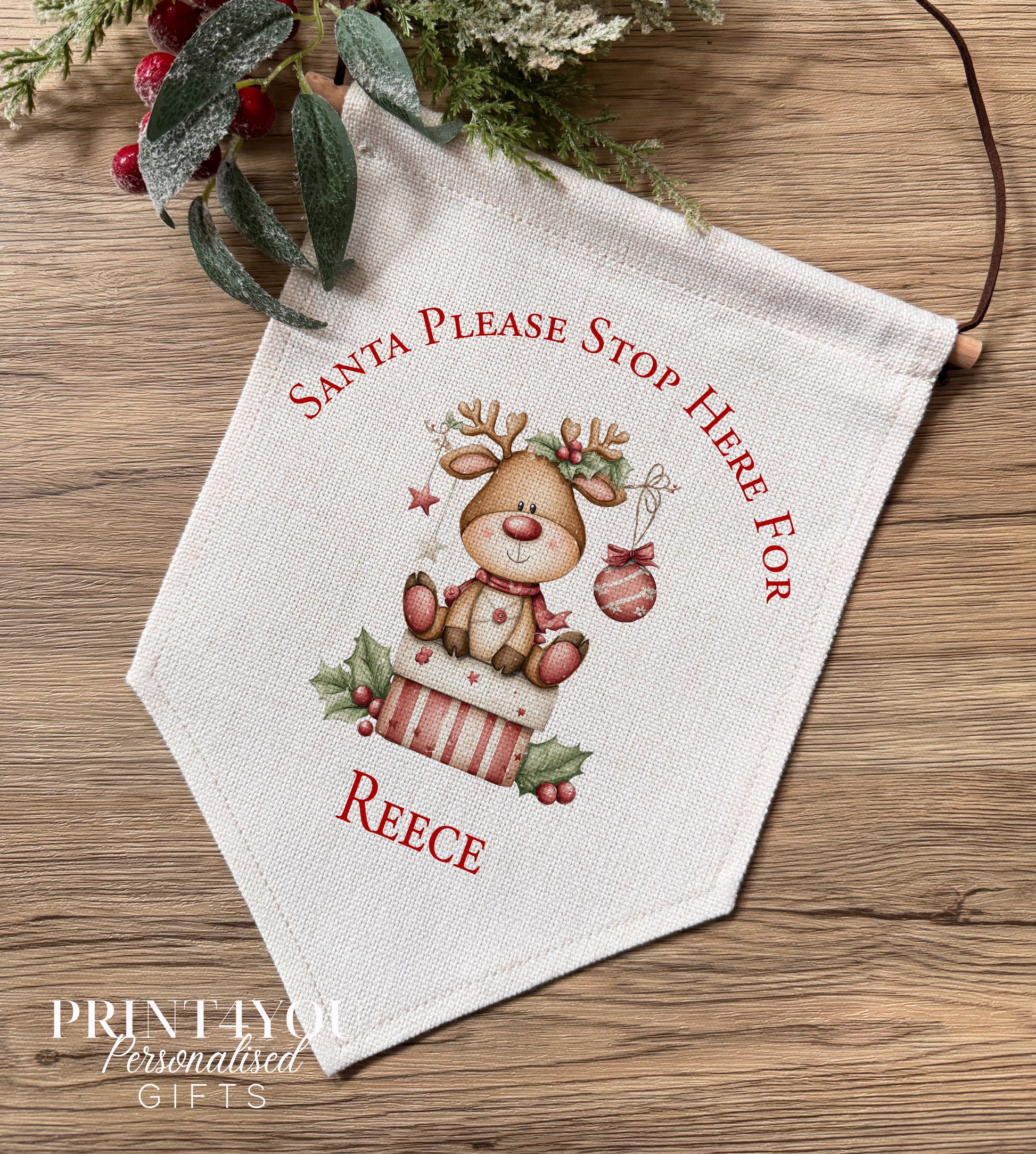 Personalised Santa Stop Here linen banner with reindeer and custom name, wooden hanging bar, wall decoration
