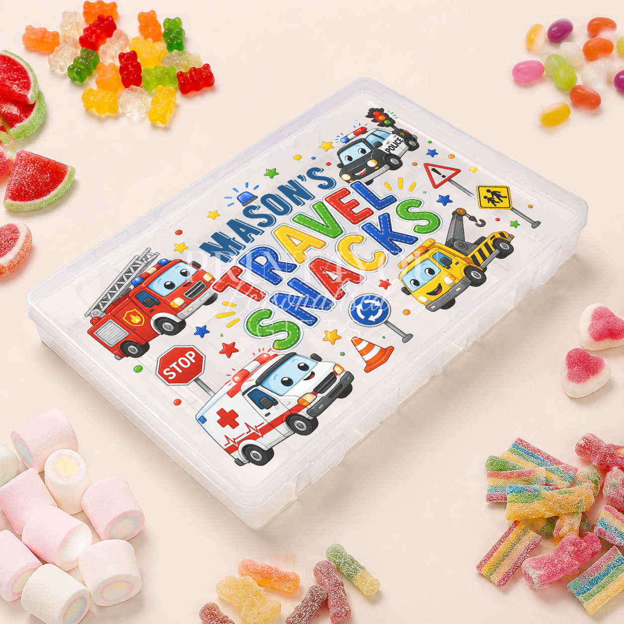 Personalised children's travel treat box featuring colourful emergency and construction vehicles