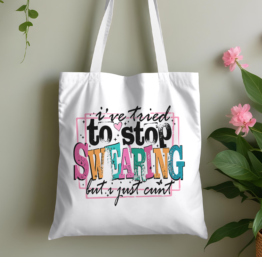Cotton tote bag featuring a bold, humorous swearing slogan print, a rude-but-fun novelty shopper for grown-ups.