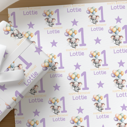Personalised purple elephant 1st birthday wrapping paper design printed with a sample name