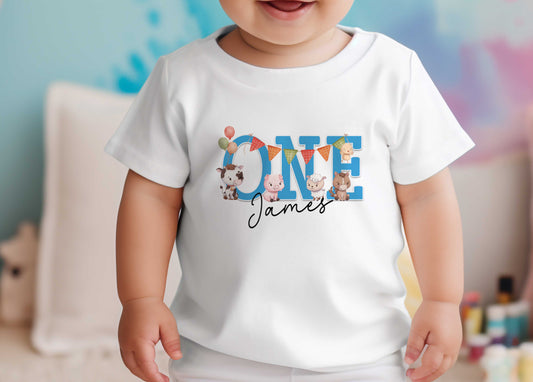 Personalised farmyard first birthday t-shirt printed with the baby's name.