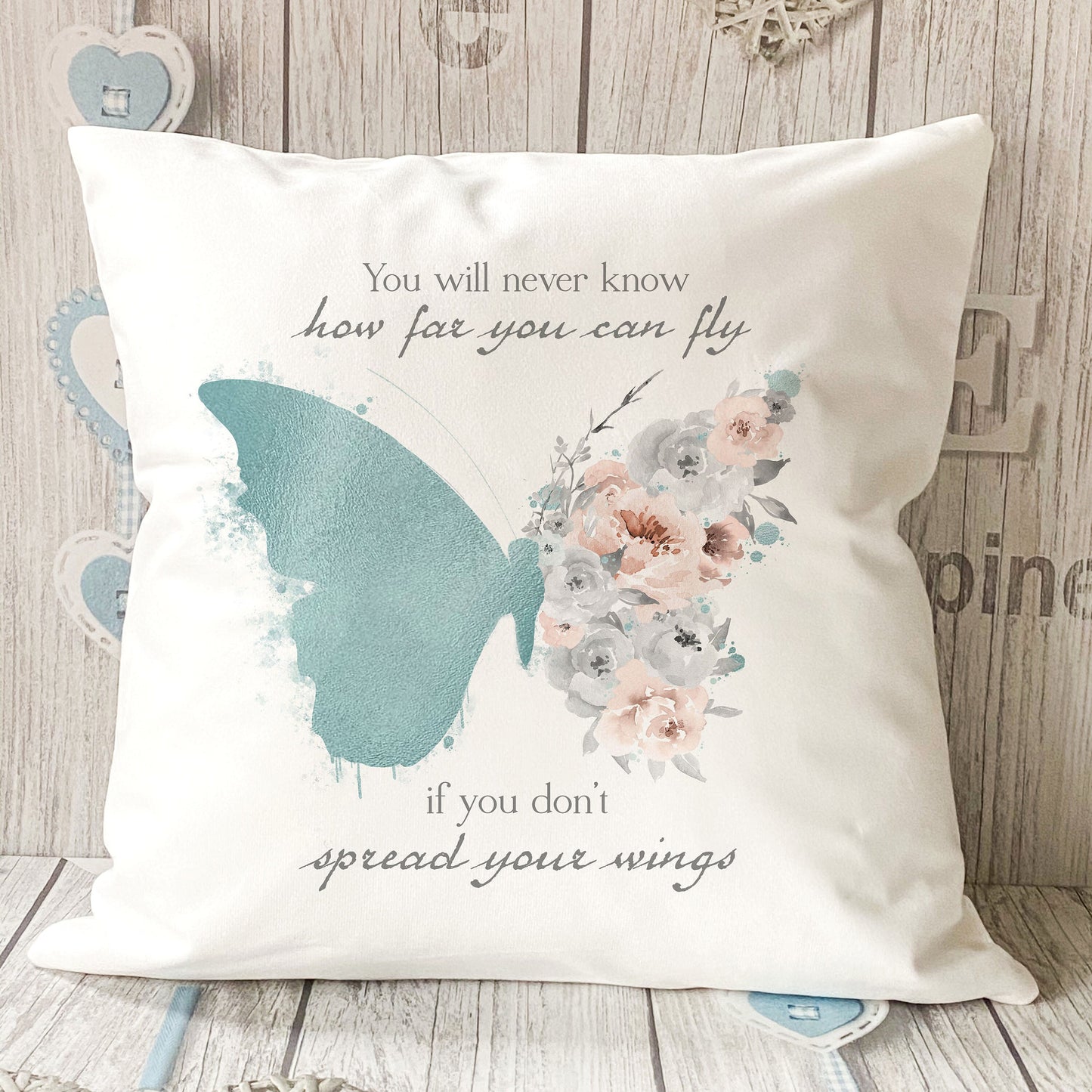 Personalised teal butterfly quote velvet cushion styled on a sofa, 40x40cm – Print4You Personalised Gifts