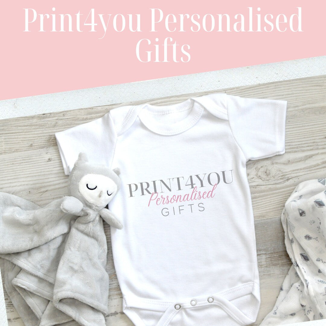 Personalised Elephant Alphabet baby t-shirt folded, showing soft cotton fabric.