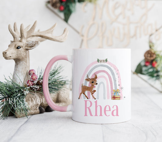 Pink trim ceramic mug printed with a baby deer and rainbow design and a personalised name