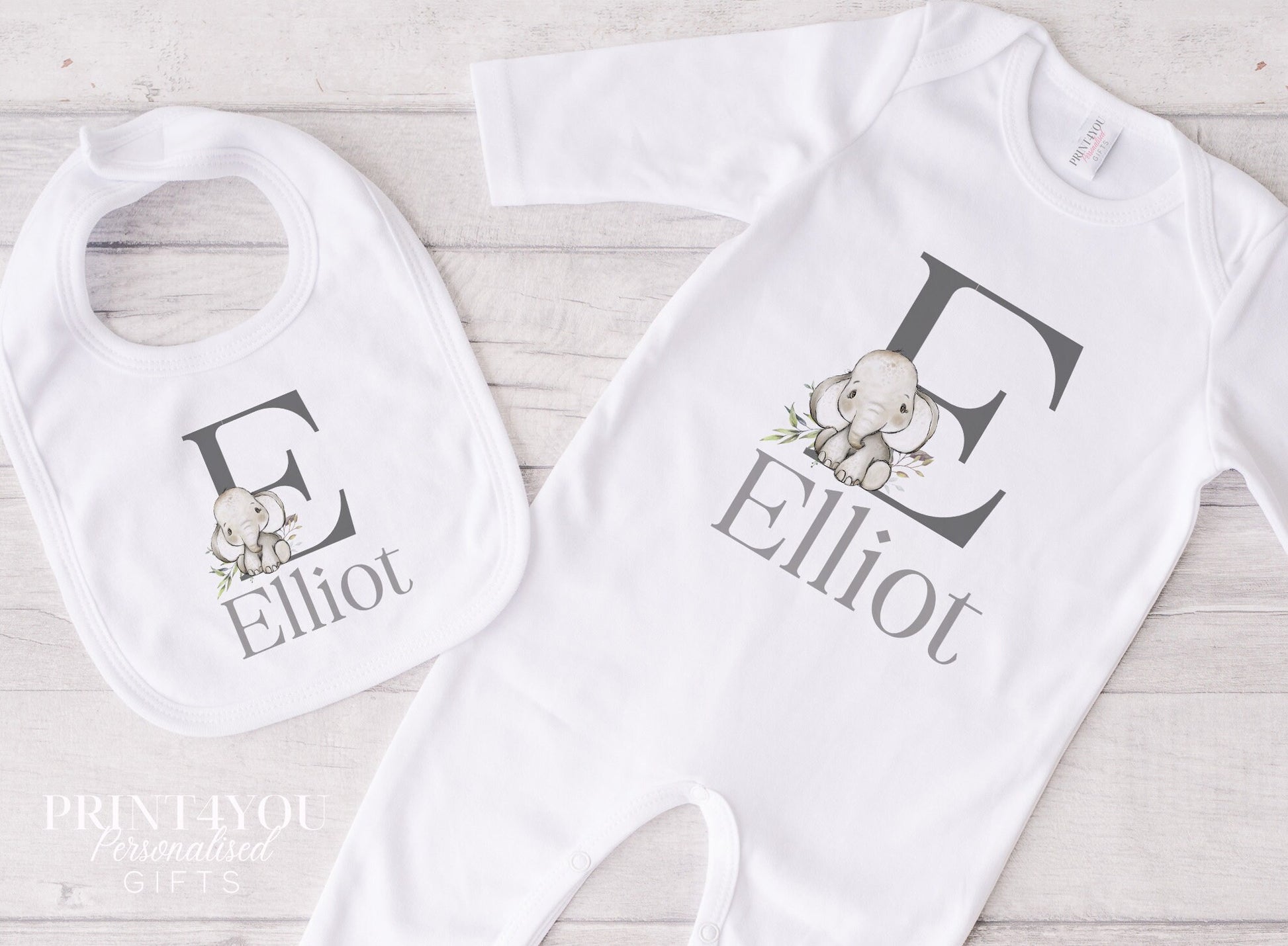 Personalised Elephant Alphabet baby bib shown with popper fastening detail.