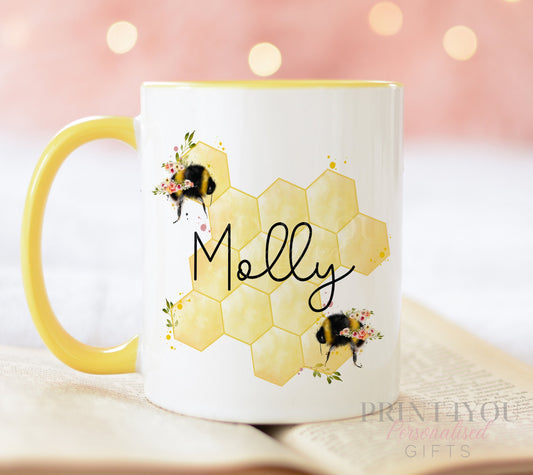 Personalised full white ceramic mug printed with a custom name and a yellow trim honeycomb bee design