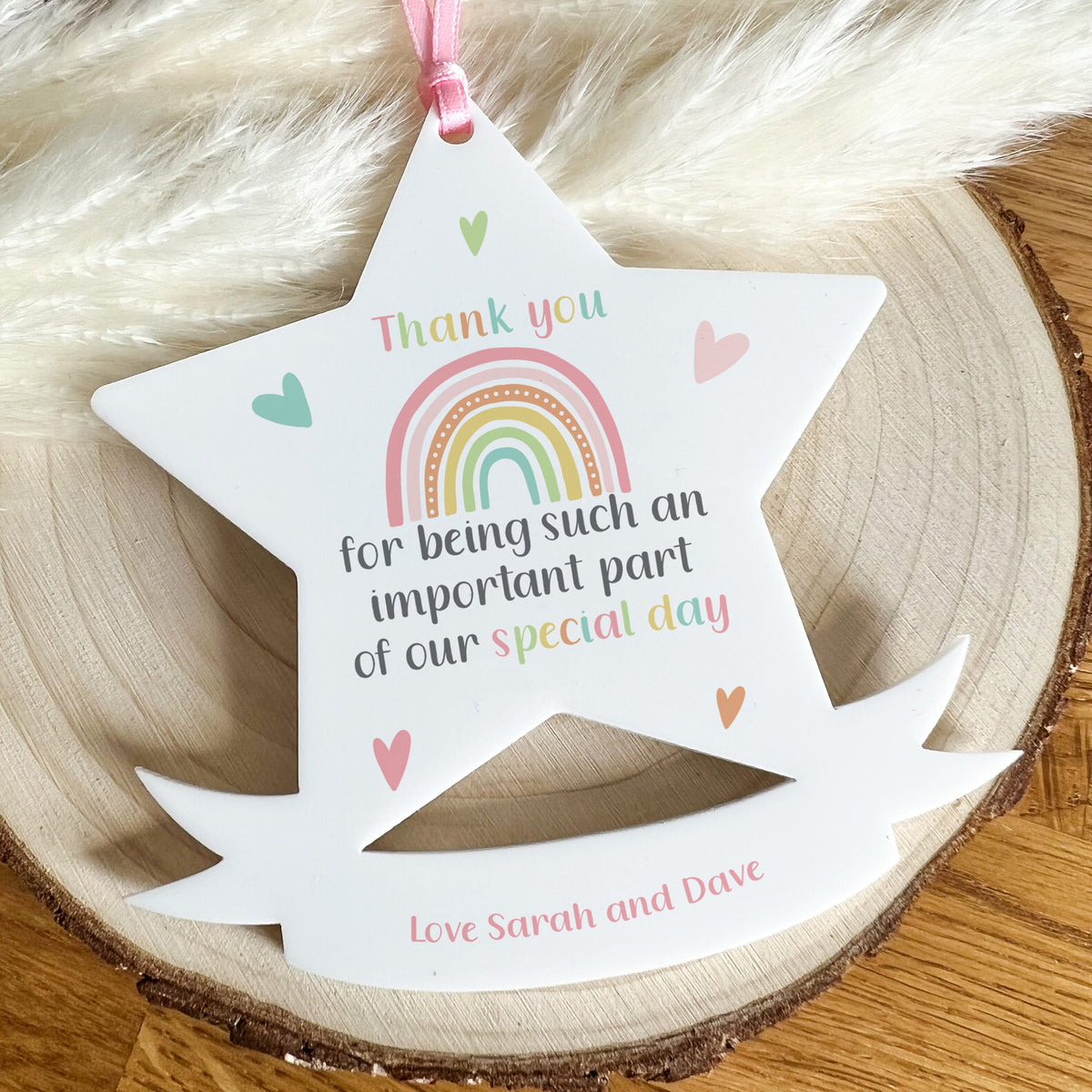 Personalised white acrylic star printed with the message 'Thank you for being such an important part of our special day', a wedding guest favour.