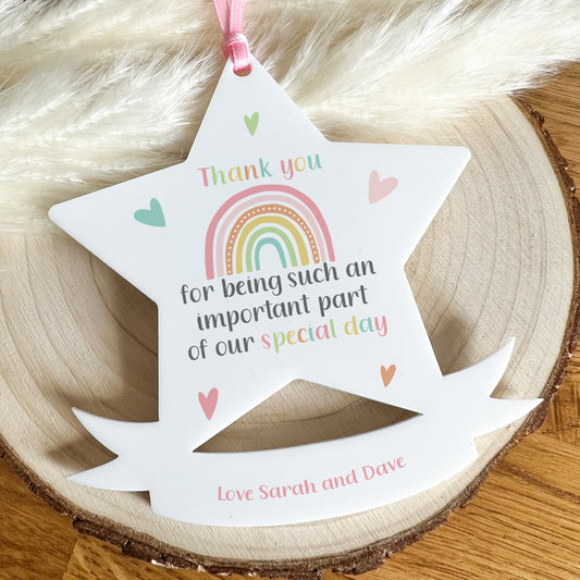 Personalised white acrylic star printed with the message 'Thank you for being such an important part of our special day', a wedding guest favour.