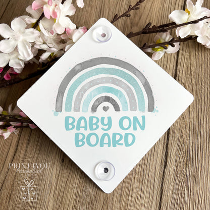 Rainbow Baby on Board aluminium car window sign fitted with suction cups on a car window