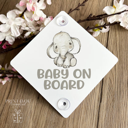 Baby on Board aluminium car window safety sign with suction cups attached to a car window, baby elephant design – Print4You Personalised Gifts