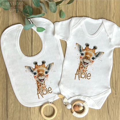 Close-up of the safari giraffe design and personalised name print on soft cotton.