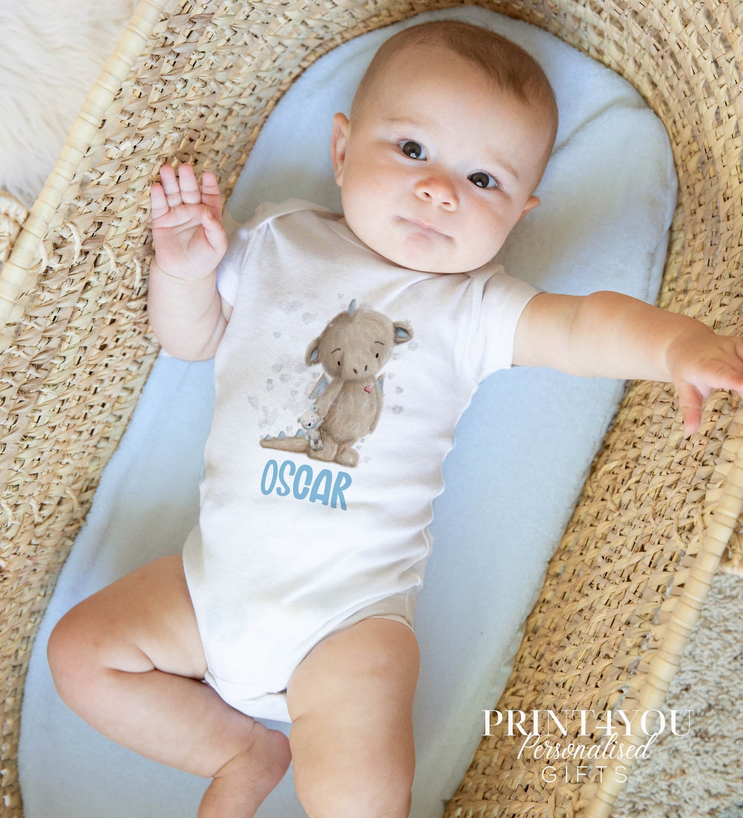 Personalised blue baby dragon new baby gift set, printed with your baby's name on soft cotton.