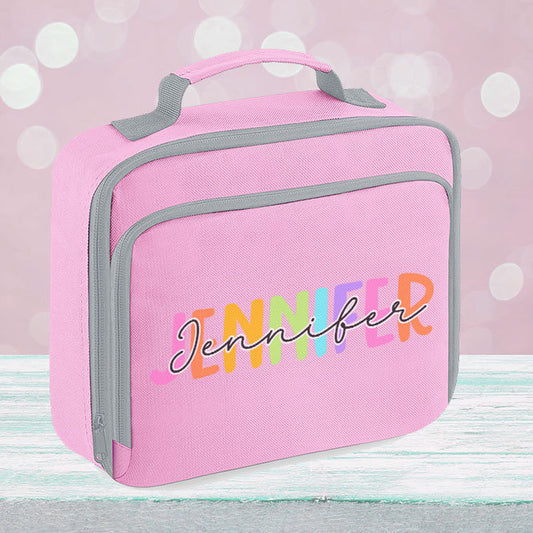Pink insulated lunch cooler bag with front zip pocket, personalised with the colourful name Jennifer.