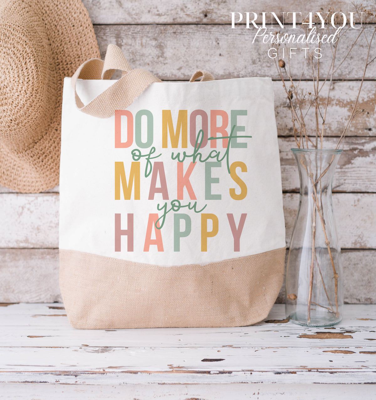 Cream and natural jute tote bag printed with the colourful positivity slogan 'Do more of what makes you happy', XL size.