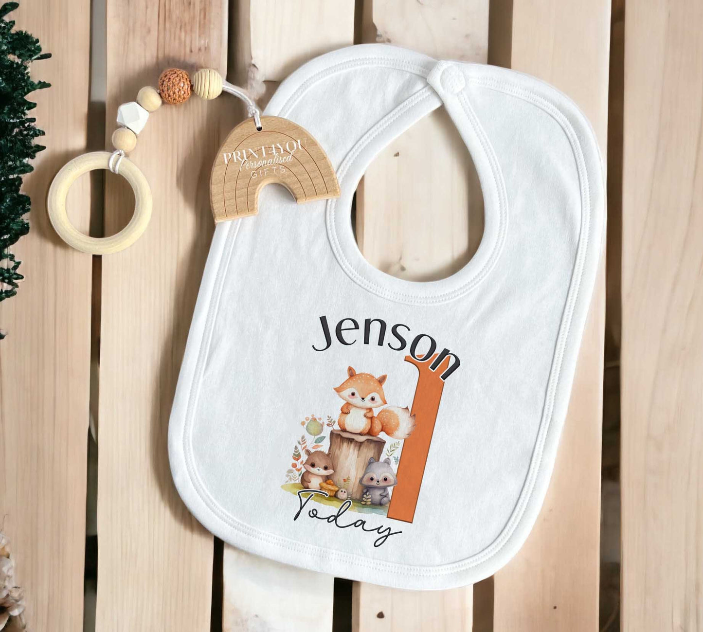 Soft cotton sleepsuit printed with the Woodland Fox first birthday design.