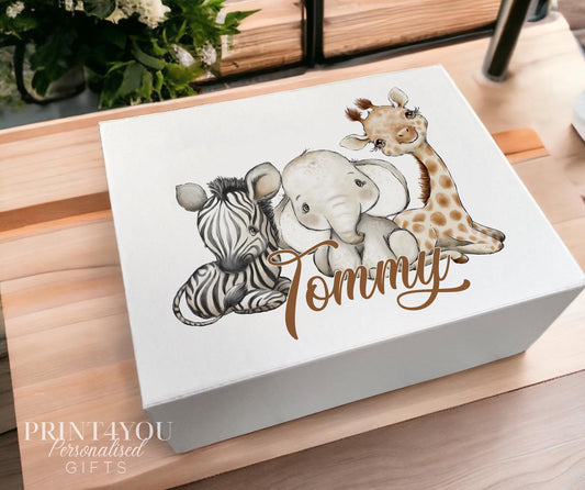White magnetic personalised keepsake box printed with a zebra, elephant and giraffe safari design and the name 'Tommy'