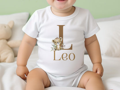 White cotton baby bib personalised with a lion design and the baby's name, for a new baby gift.