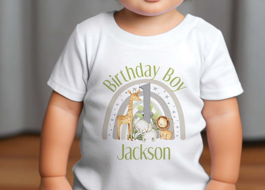 Personalised Safari Rainbow first birthday bib in white cotton with custom name, number one and safari animal rainbow print.