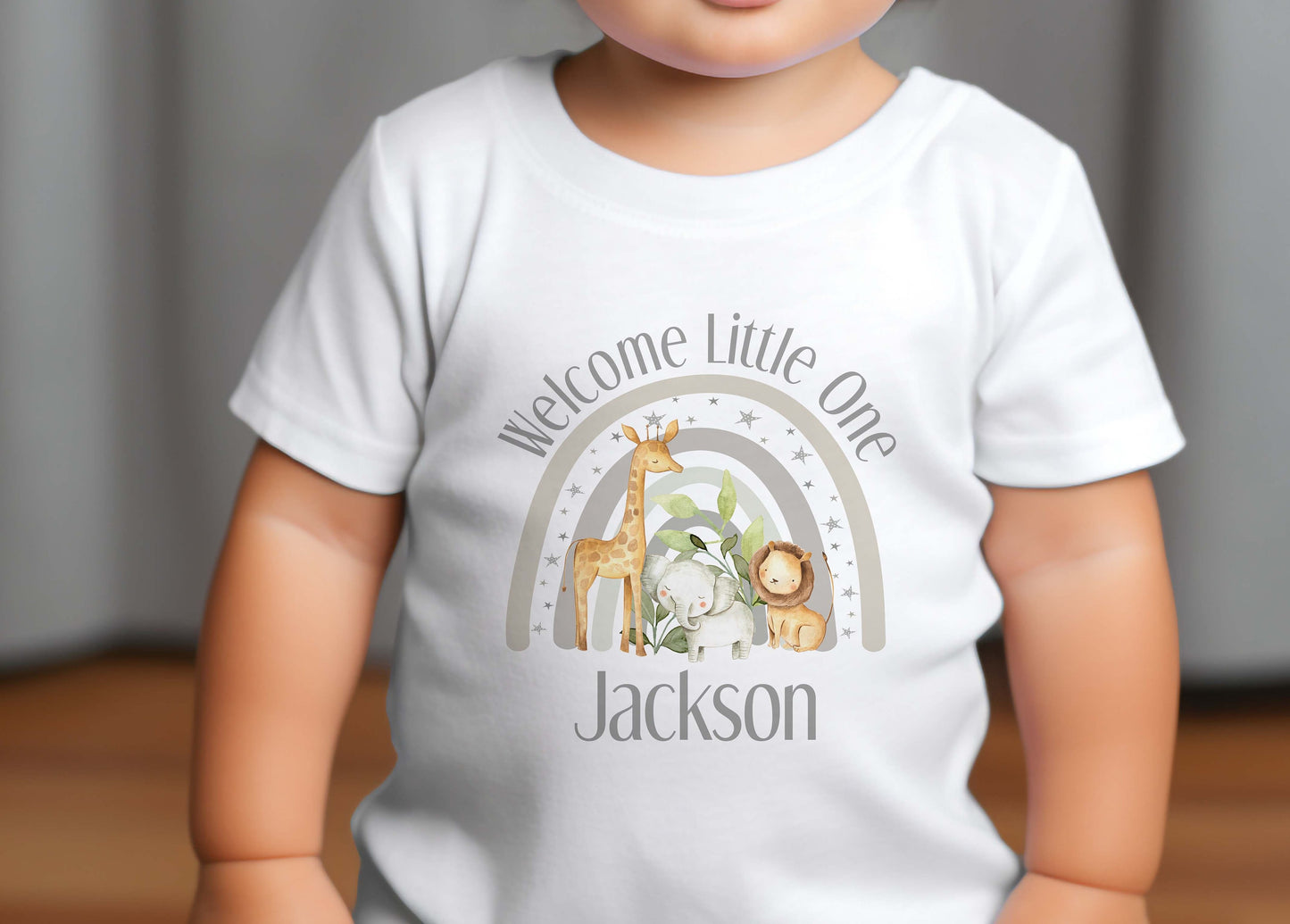 Close-up of the grey safari print and 'welcome little one' text with baby's name.