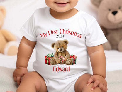 Close-up of the Baby's First Christmas teddy bear print with personalised name.