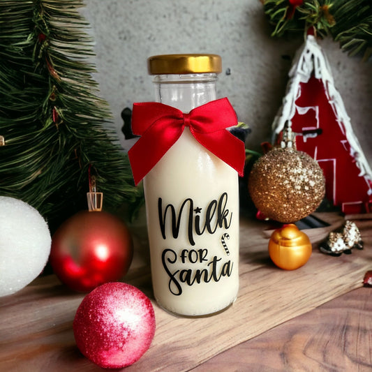 Santa's Milk Bottle with gold cap – front view of the glass bottle