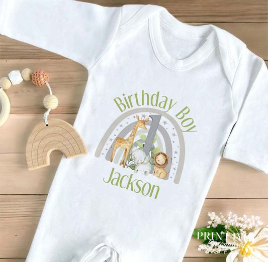 Personalised safari rainbow number one birthday bib with baby's name printed on soft white cotton.