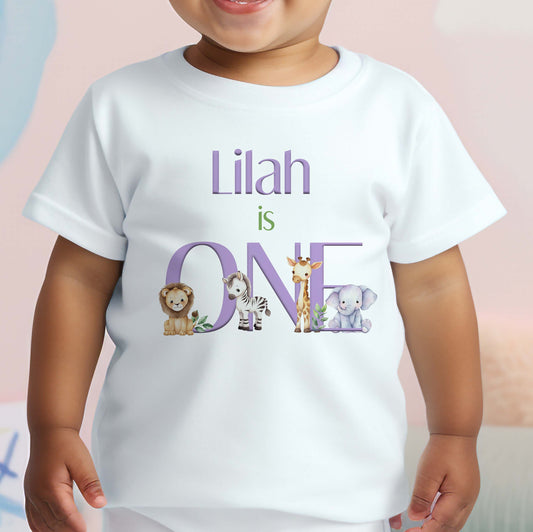 Personalised safari purple lilac first birthday bib with jungle animal artwork and the baby's name.