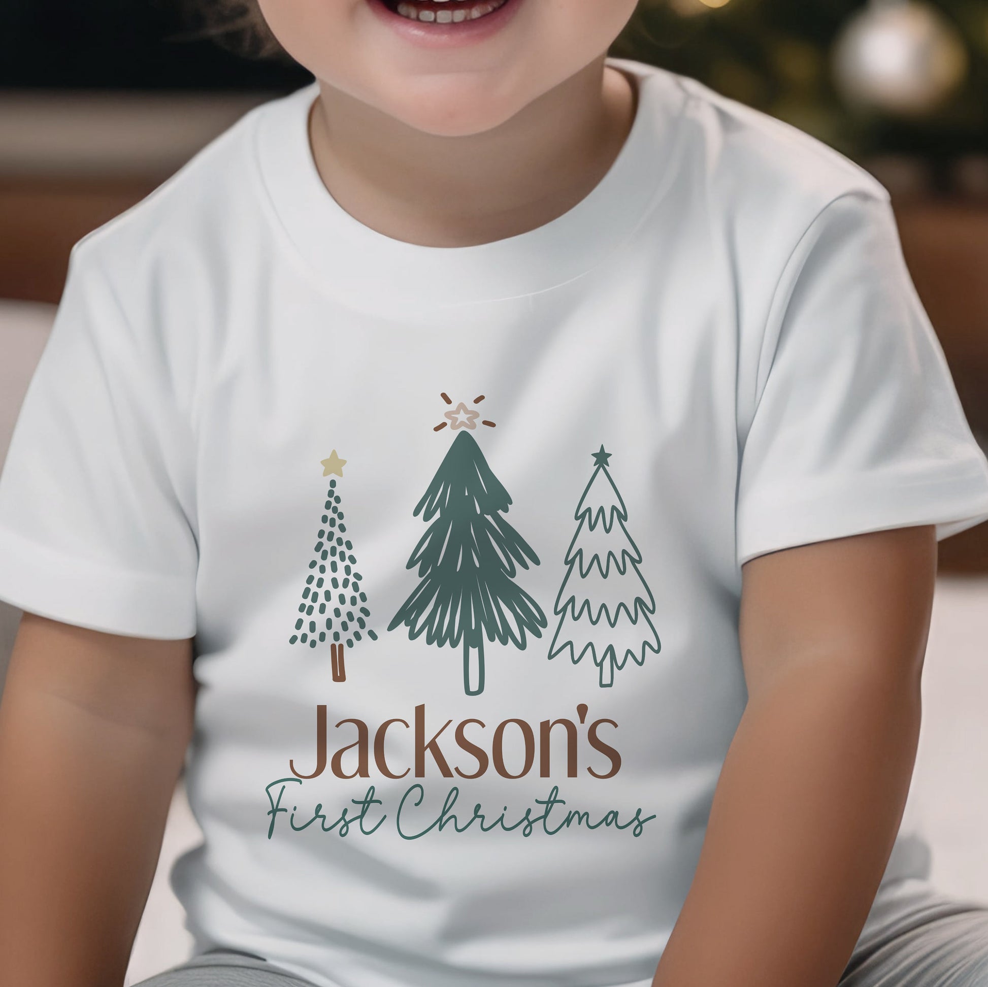 Personalised baby vest with a first Christmas design, printed on soft cotton.