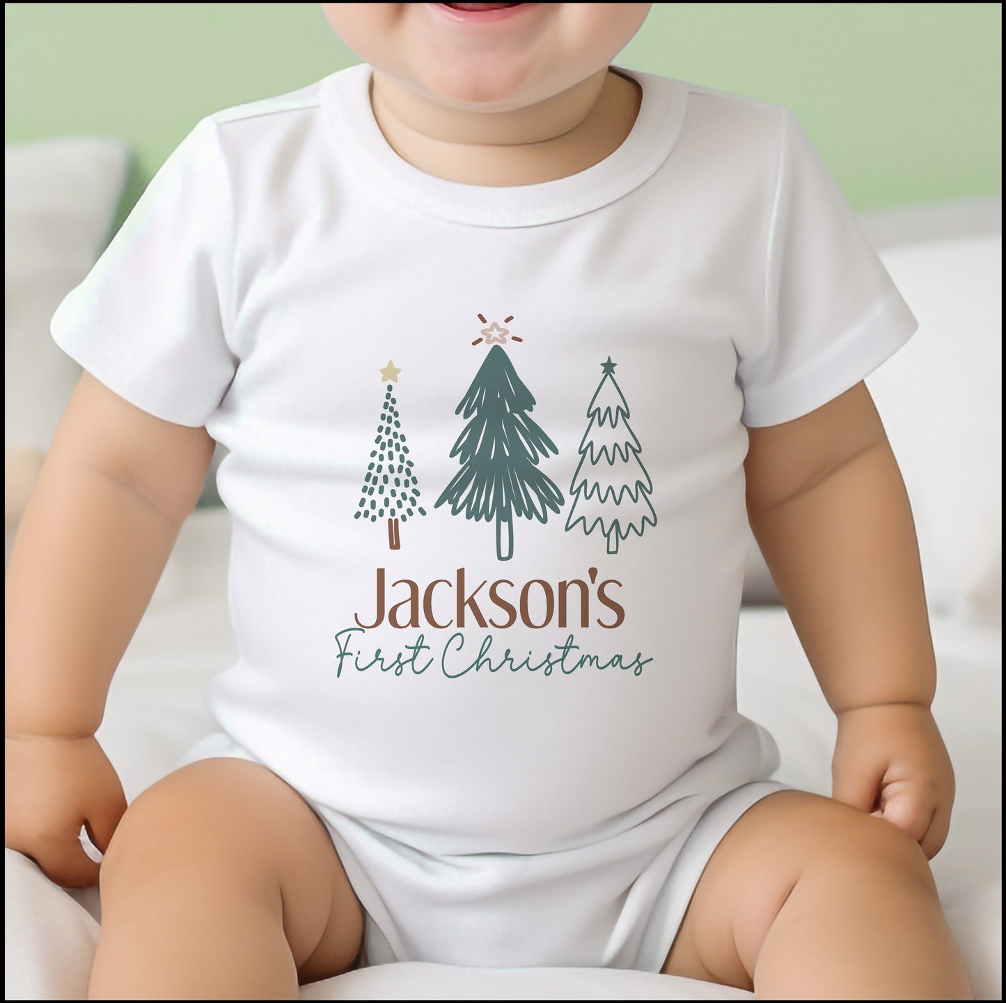 Personalised baby bib printed with a festive design for baby's first Christmas.