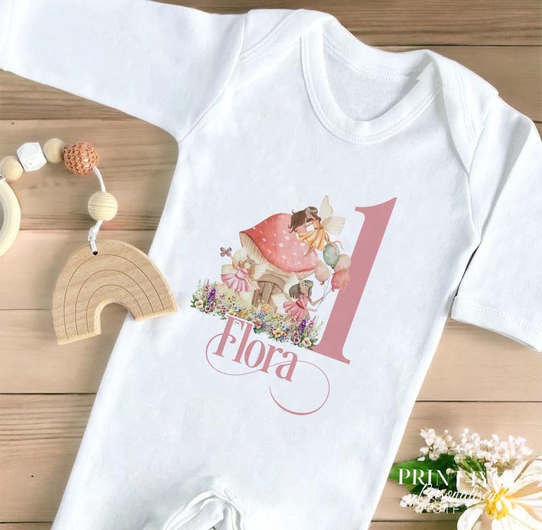 Personalised pink fairytale fairies first birthday outfit, ready for your baby's name to be added.