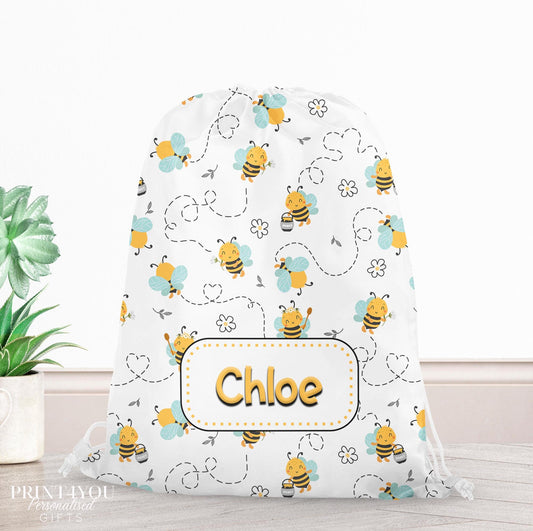 Personalised bumble bee print drawstring PE bag with a child's name printed on the front