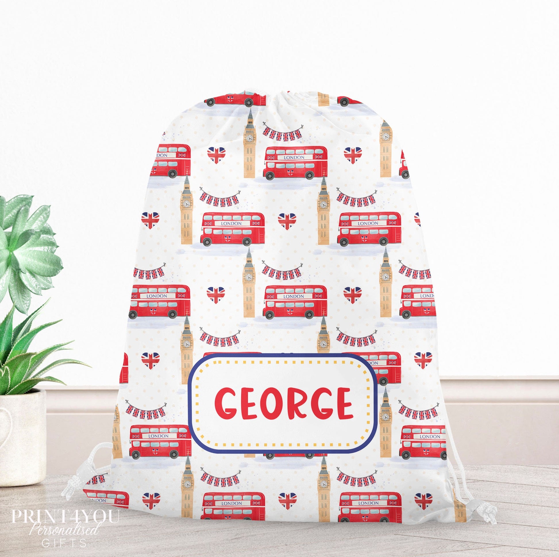 Drawstring PE bag printed with a fun London landmarks design, personalised with a child's name across the front