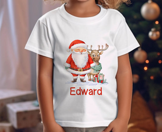 Personalised Children's Christmas T – Shirt – Exclusive Design, Father Christmas with Reindeer and name - 6-12 months  T-shirt