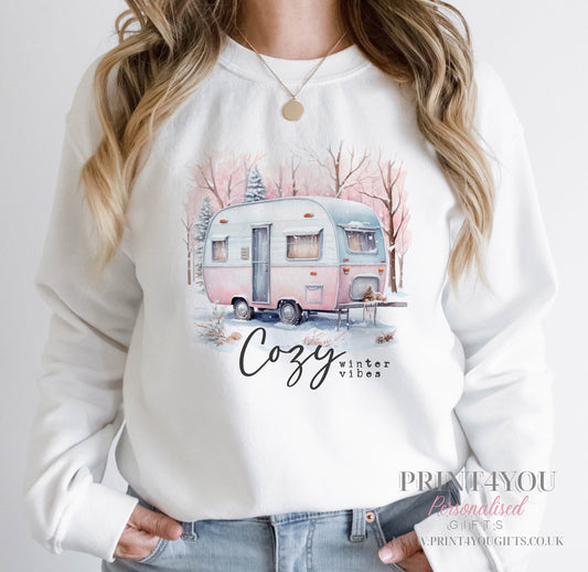 Ladies white Christmas jumper with Cozy Winter Vibes caravan design, size 8.