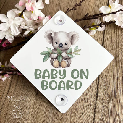 Baby on board aluminium car window sign with koala bear design and window suction cups attached