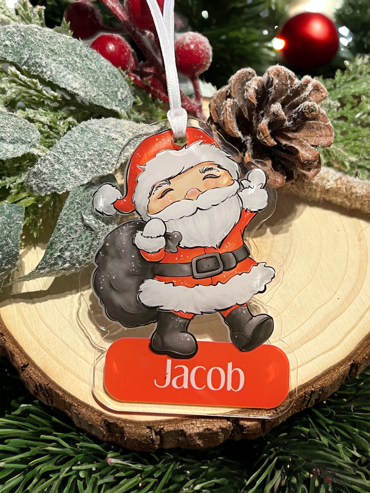 Personalised acrylic Father Christmas Santa Claus tree bauble with custom name, shown with optional gift box